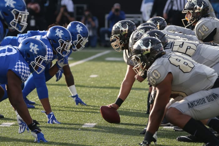 Vanderbilt's offensive line lines up against Kentucky's defense.