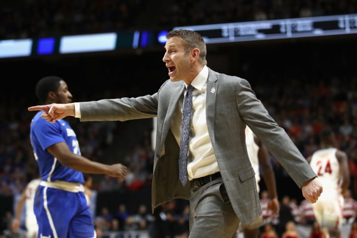 Buffalo Bulls head coach Nate Oats reacts.