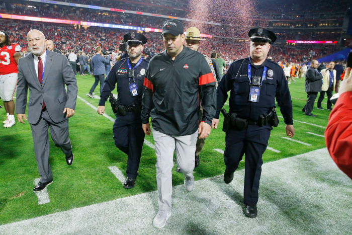 Ohio State head coach Ryan Day walks off the field after the Fiesta Bowl.