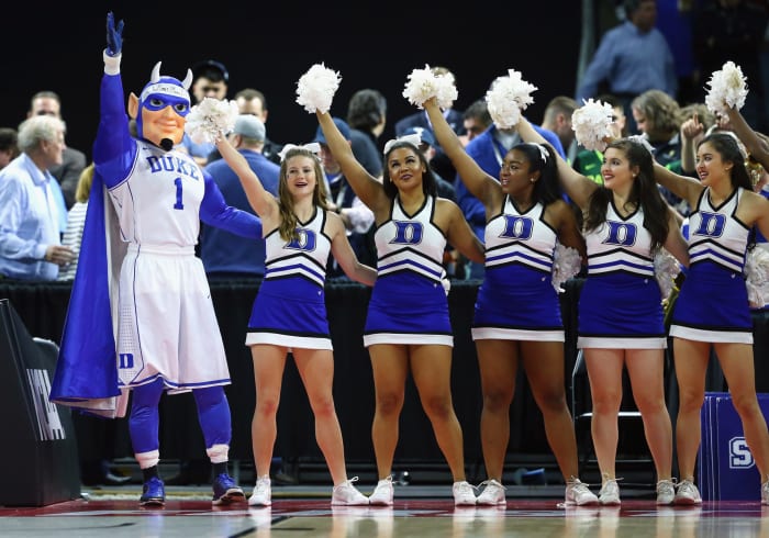 Duke basketball cheerleaders performing during a game.