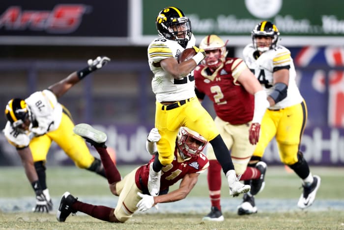 Akrum Wadley runs the ball for Iowa.