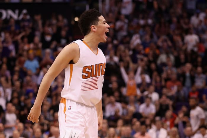Devin Booker celebrates.