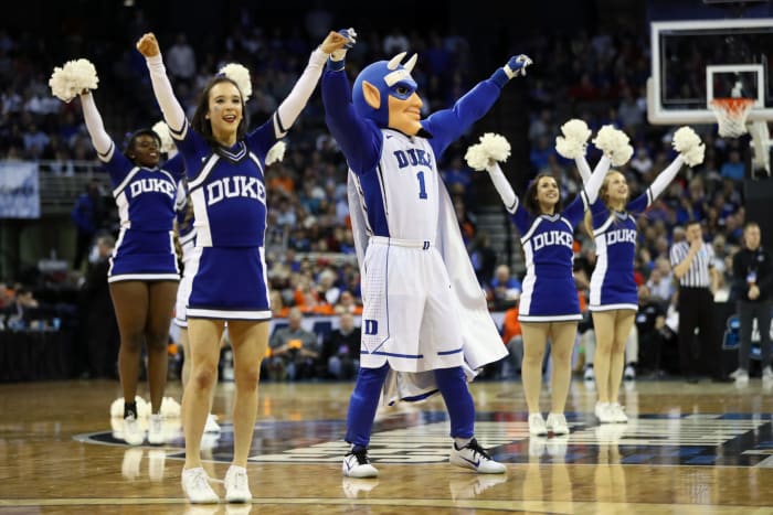 Duke basketball cheerleaders performing during a game.