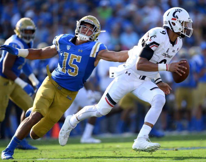 Jaelan Philips chases down the quarterback.
