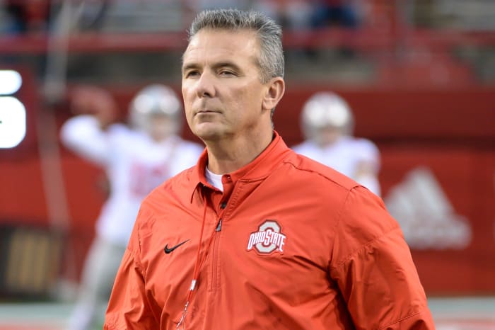 A closeup of Urban Meyer wearing an Ohio State jacket.
