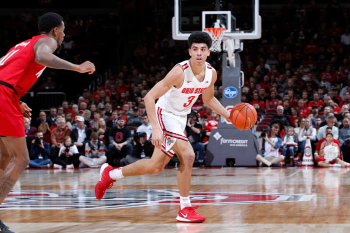 Ohio State point guard D.J. Carton dribbles during a game.