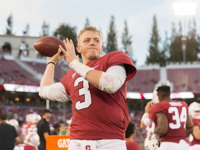 Stanford QB K.J. Costello throwing during warmups.