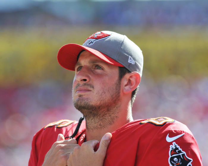 Dan Orlovsky on the field before a game.