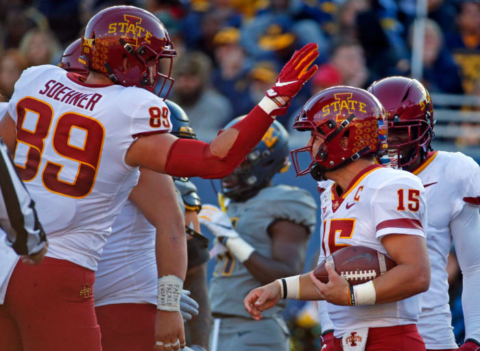 Dylan Soehner celebrates with Iowa State quarterback Brock Purdy.