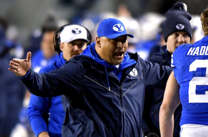 BYU football coach Kalani Sitake celebrates a play.