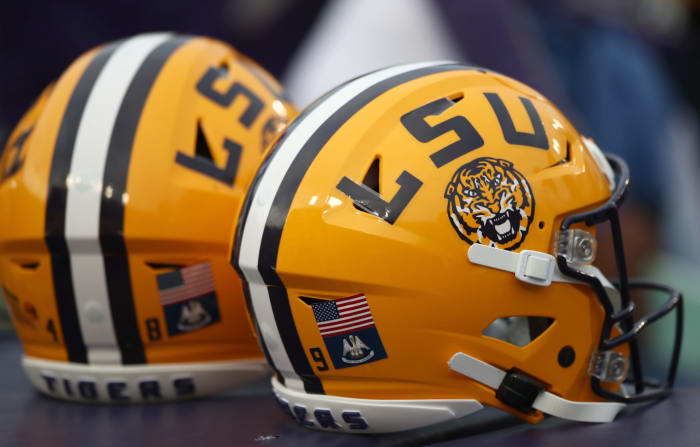 LSU football helmets are seen sitting alone.
