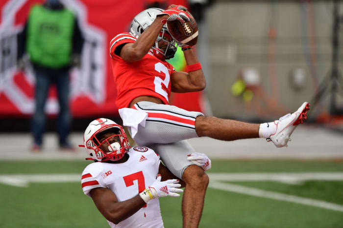 Chris Olave goes up for a catch.