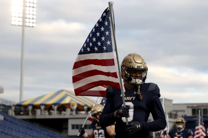 Cameron Kinley holding the flag.