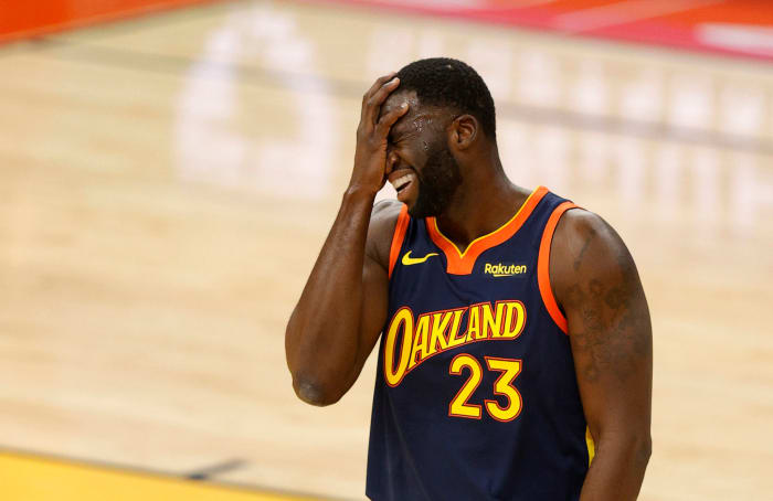 Draymond Green reacts to a bad pass.