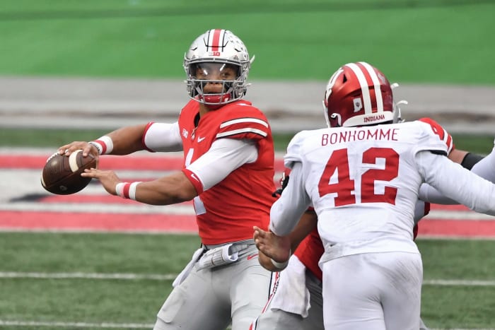 Justin Fields attempts a pass.