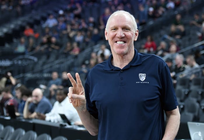 Bill Walton giving a peace sign.