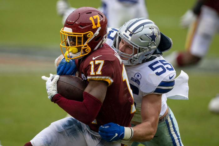 Washington wide receiver Terry McLaurin gets tackled by Dallas Cowboys LB Leighton Vander Esch.