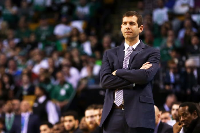 Brad Stevens crossing his arms.