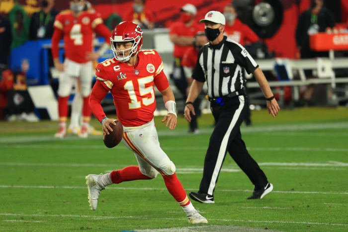 Patrick Mahomes running on the field at Super Bowl LV.