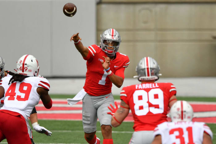 Ohio State quarterback Justin Fields throws a pass.