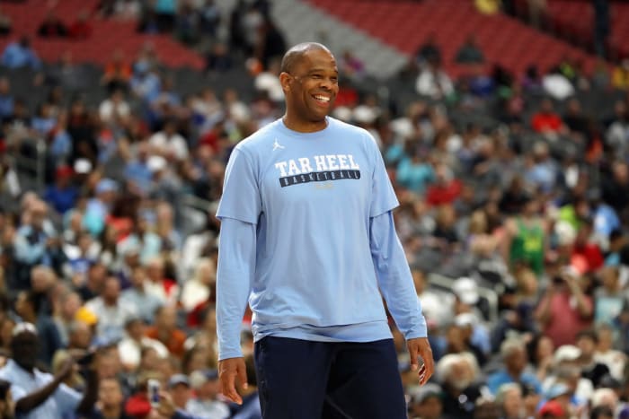 Hubert Davis smiles during a UNC practice at the Final Four.