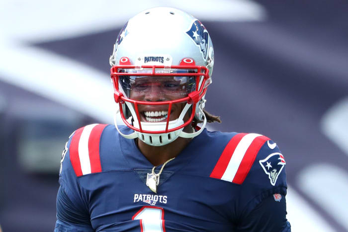 New England Patriots quarterback Cam Newton smiles.