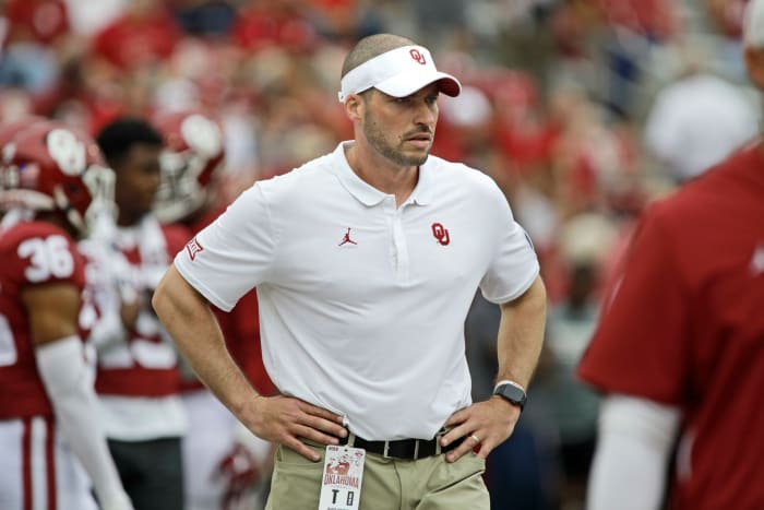 Oklahoma football defensive coordinator Alex Grinch looks on.