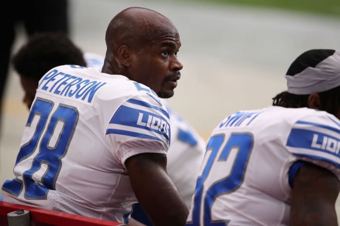 Adrian Peterson sits on the bench.