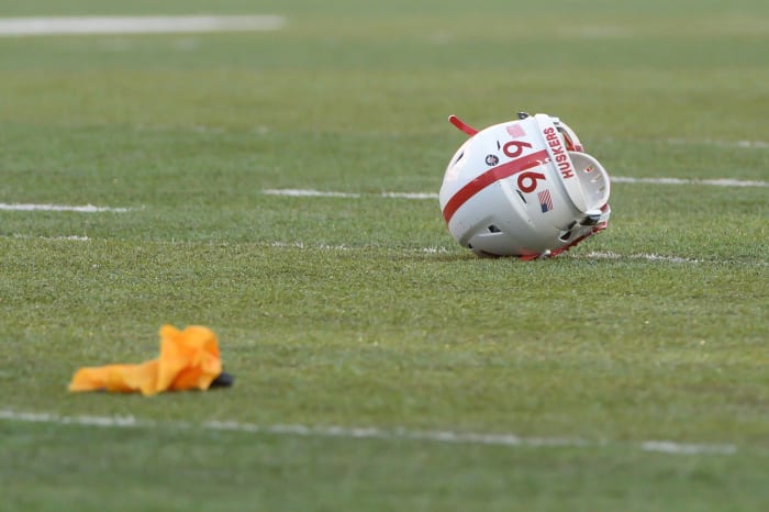 A Nebraska helmet on the field during a penalty.