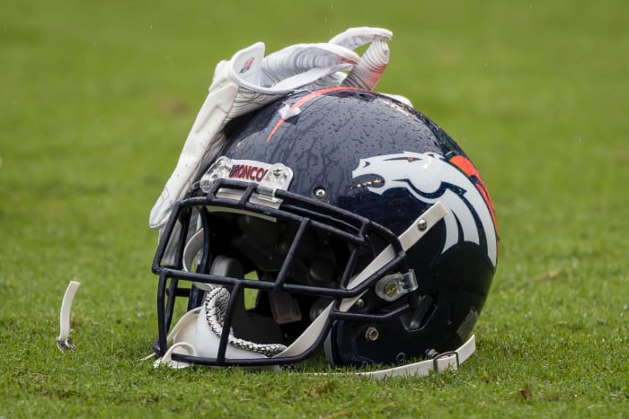 Denver Broncos helmet on the field.