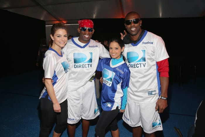 Deion Sanders and Terrell Owens at a DirecTV event with Maria .Menounos and Rocsi Diaz.
