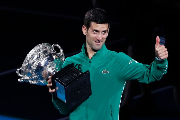 Novak Djokovic of Serbia poses with the Norman Brookes Challenge Cup