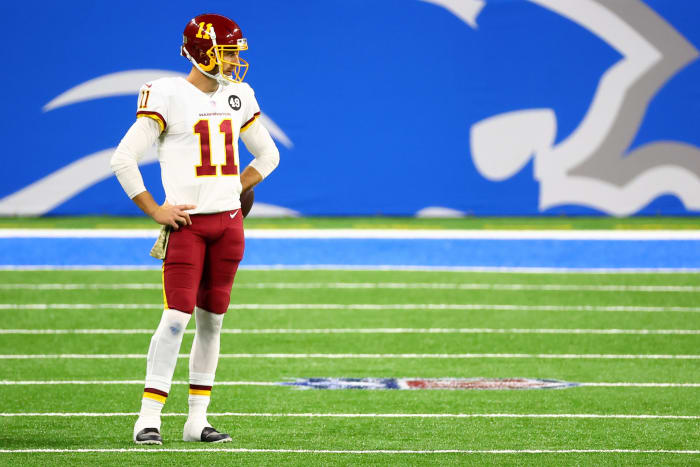 Alex Smith #11 of the Washington Football Team looks on