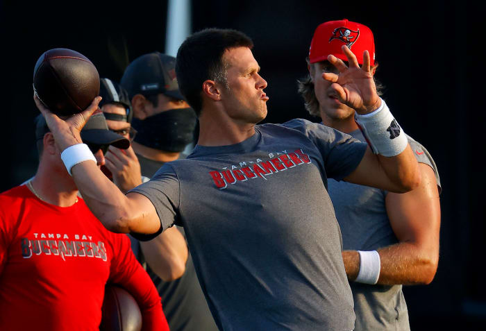 Tom Brady throws a pass in training camp for the Tampa Bay Buccaneers.