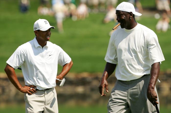 Tiger Woods wearing white with Michael Jordan