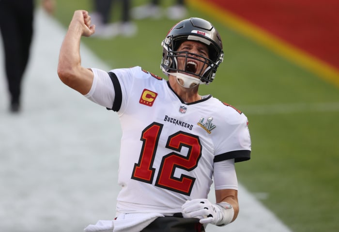 Tom Brady #12 of the Tampa Bay Buccaneers shouts as he takes the field before Super Bowl LV