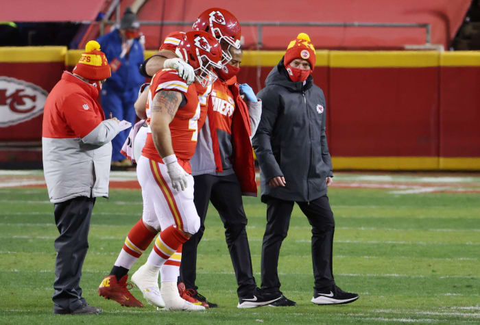 Eric Fisher gets helped off of the field.