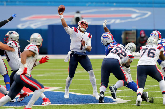 Cam Newton throws a pass against the Buffalo Bills