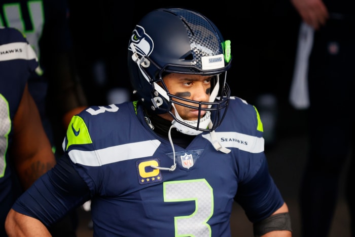 Quarterback Russell Wilson #3 of the Seattle Seahawks leads his team onto the field