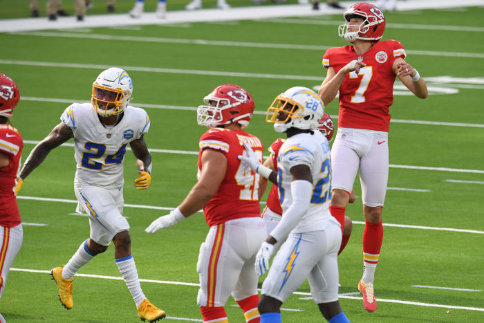 Chiefs kicker Harrison Butker watches his kick.