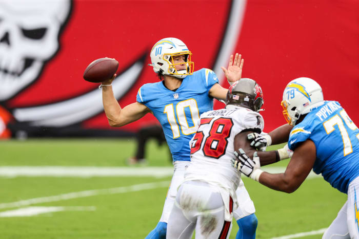 Justin Herbert drops back to attempt a pass for the Los Angeles Chargers vs. Tampa.