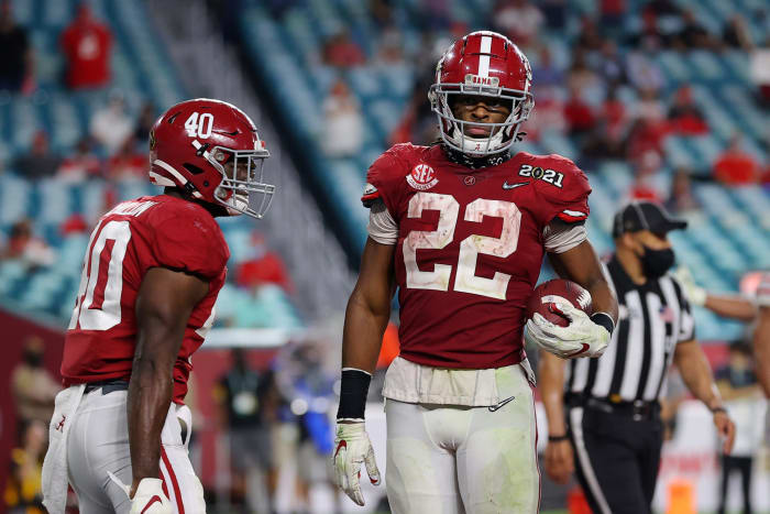 Najee Harris celebrates a touchdown against Ohio State.