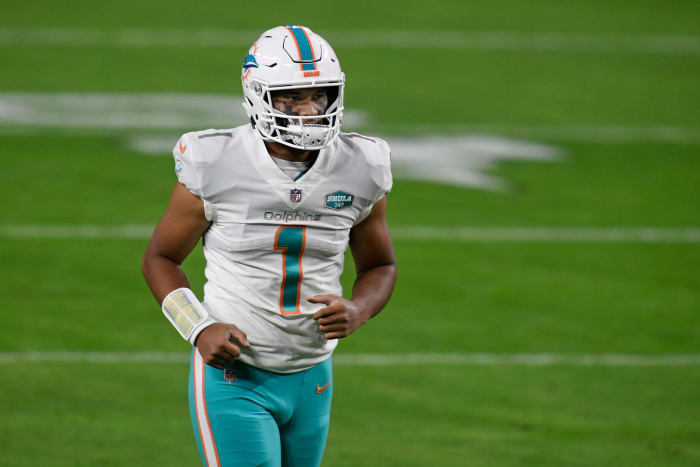 Miami Dolphins quarterback Tua Tagovailoa on the field.