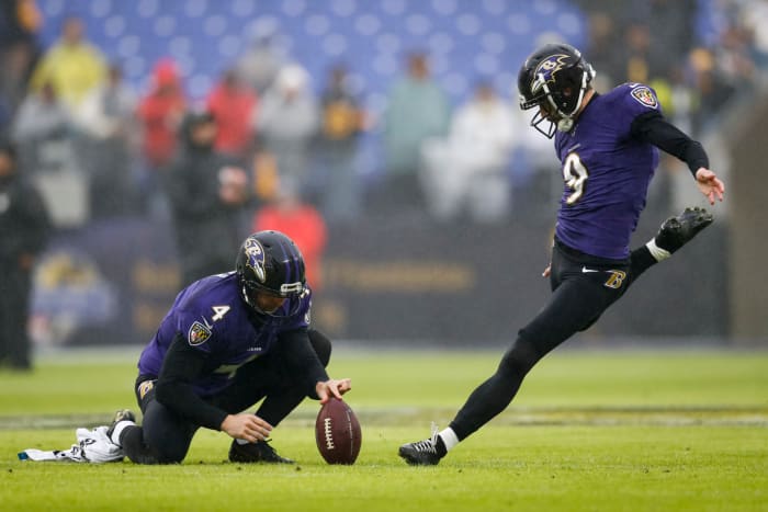 Justin Tucker attempts a field goal for the Baltimore Ravens.
