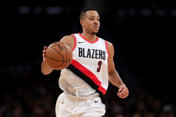 C.J. McCollum dribbling the ball.