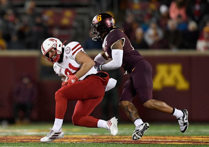 Nebraska football captain Kade Warner catches pass against Minnesota.