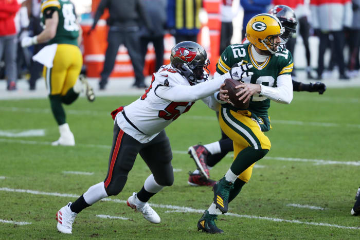 Tampa Bay Buccaneers star Shaquil Barrett tackling Green Bay's Aaron Rodgers in the NFC Championship game.