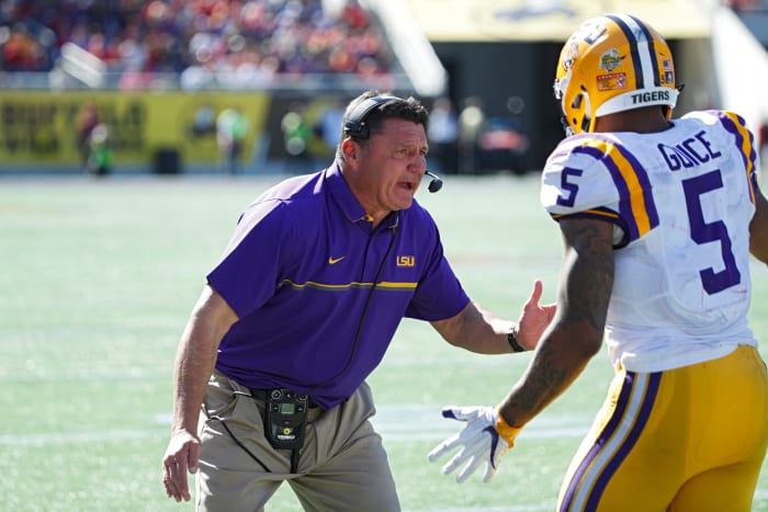 LSU Coach Ed Orgeron celebrating with Derr