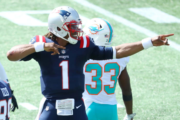 Cam Newton celebrates after a first down for the New England Patriots in 2020.