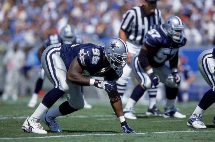 Dallas Cowboys DE Greg Ellis in a three-point stance.